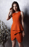 Dianna Centre Fold Peplum Dress in Burnt Orange